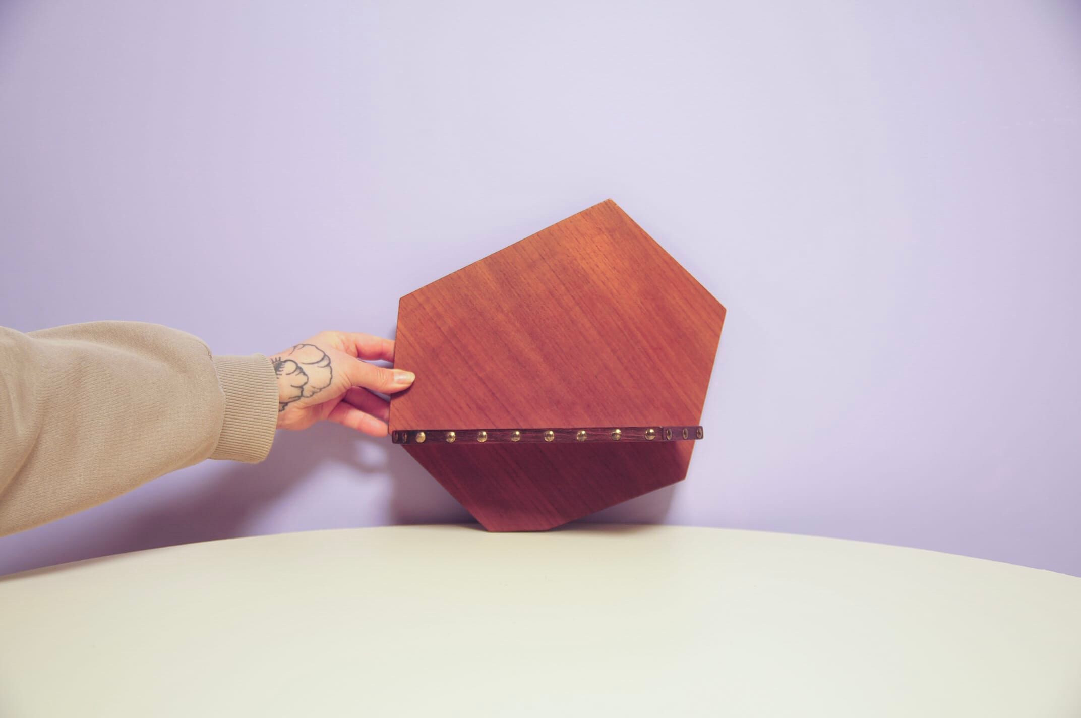 Asymmetrical wall shelf studs