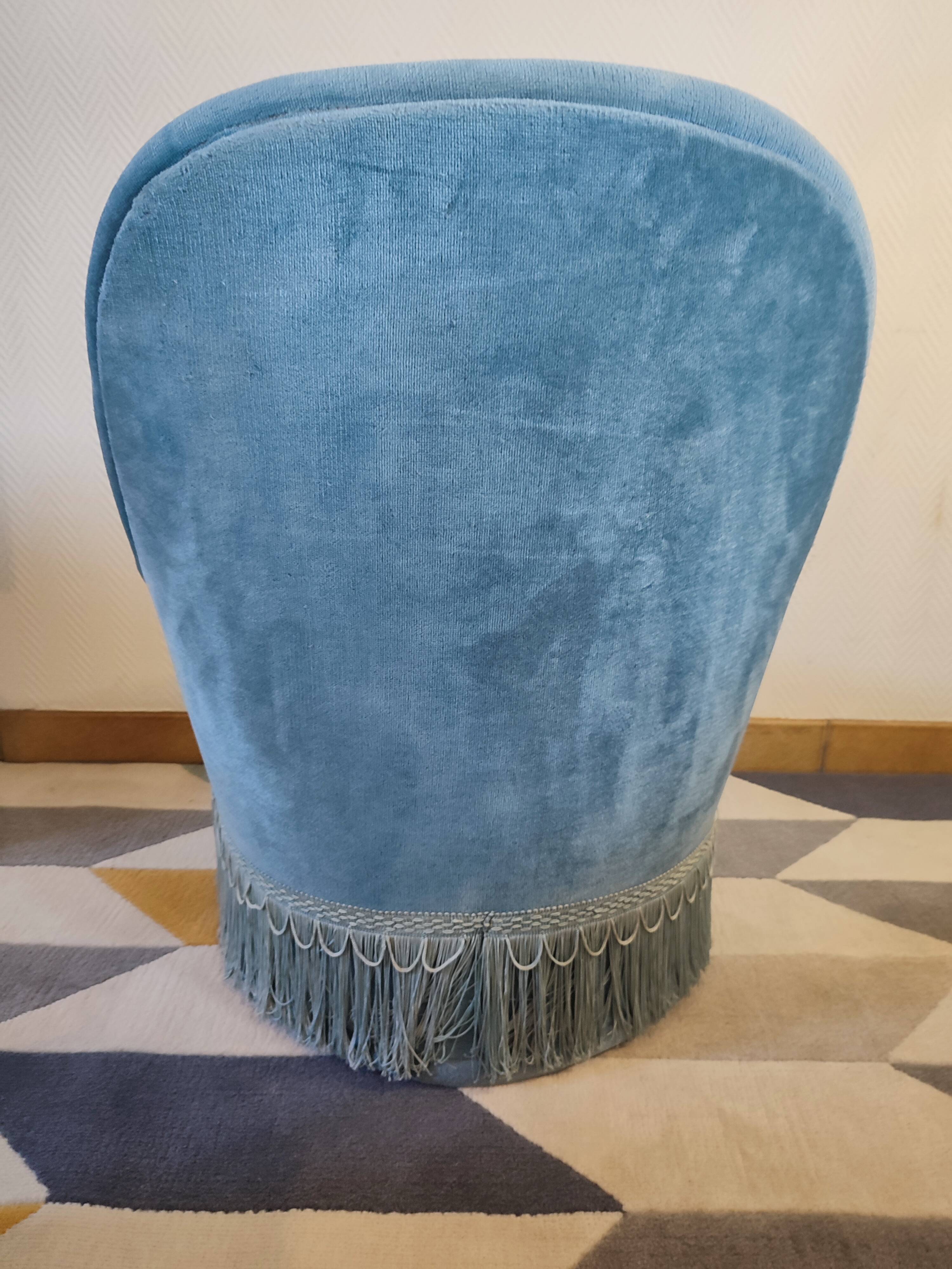 Pair of Crapaud armchairs and a vintage blue velvet pouf