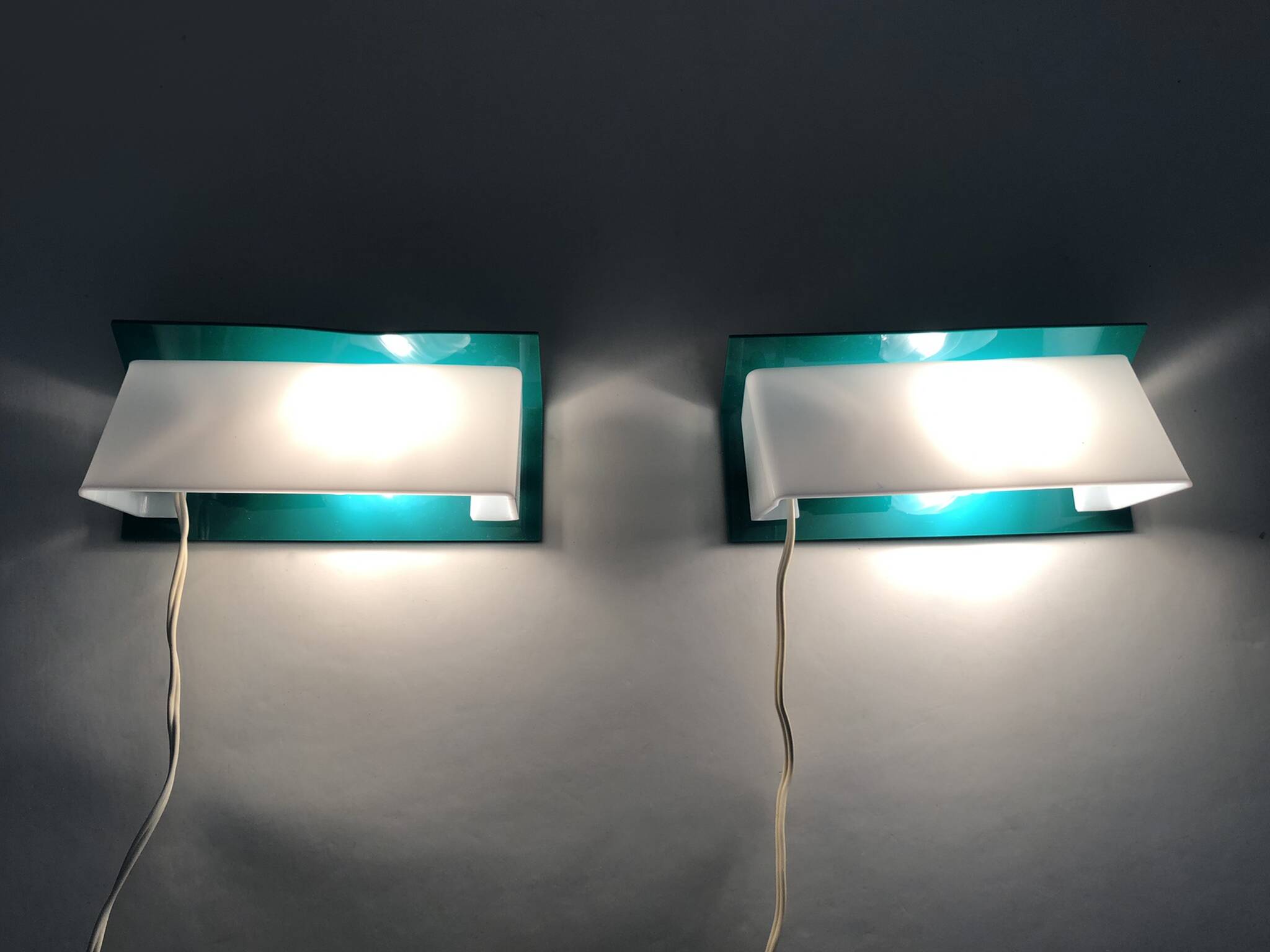 Pair of wall sconces with Scandinavian green and white shutters. 1980s.