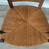 Straw armchair folk art.