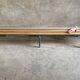 Vintage wood kindergarten bench and tubular structure in long