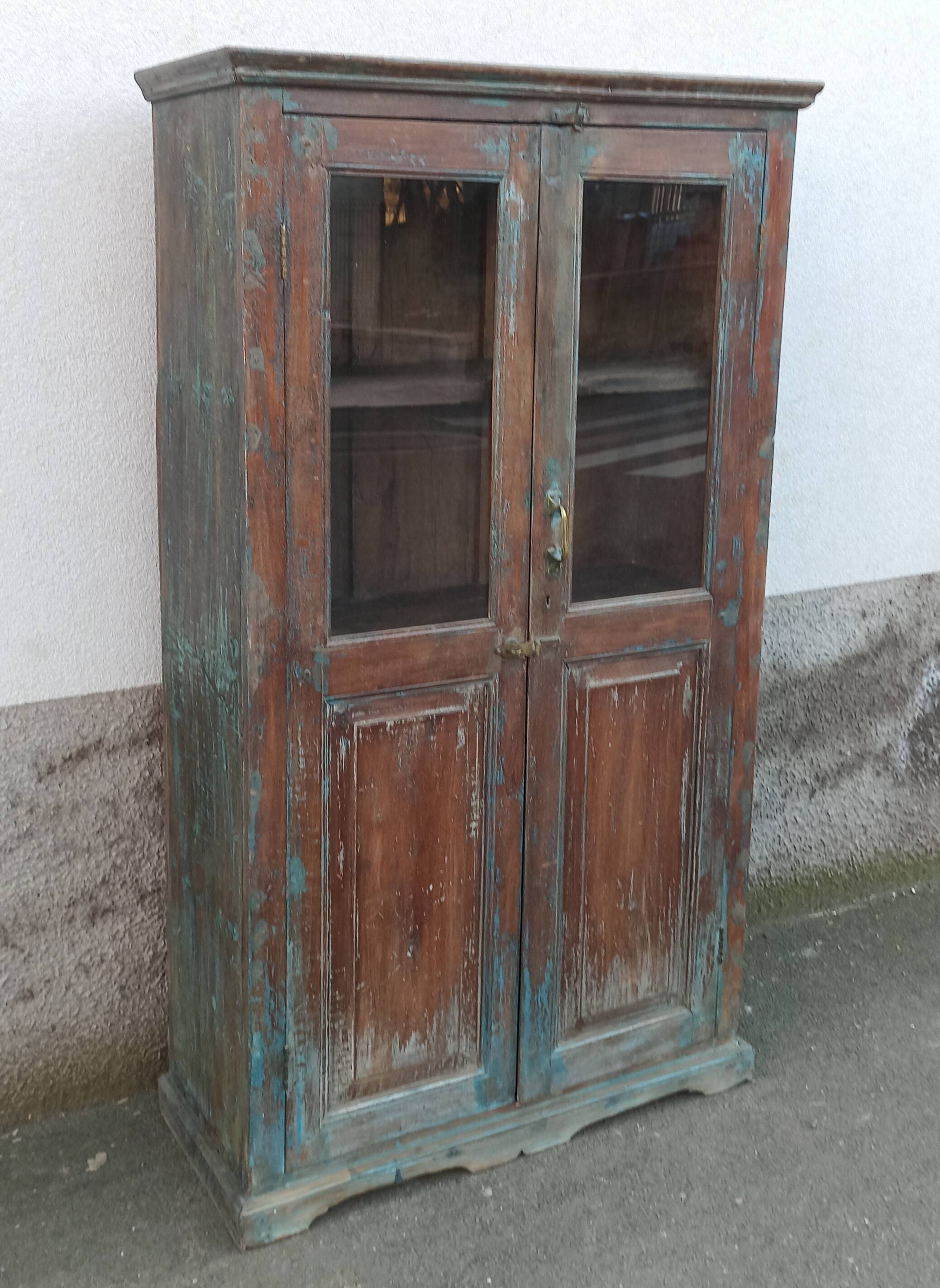 Old glazed wooden cabinet with beautiful patina