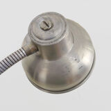 Old industrial articulated lamp with vice. Year 50