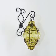 Italian vintage wall lamp in yellow blown glass and wrought iron. Year 70 80