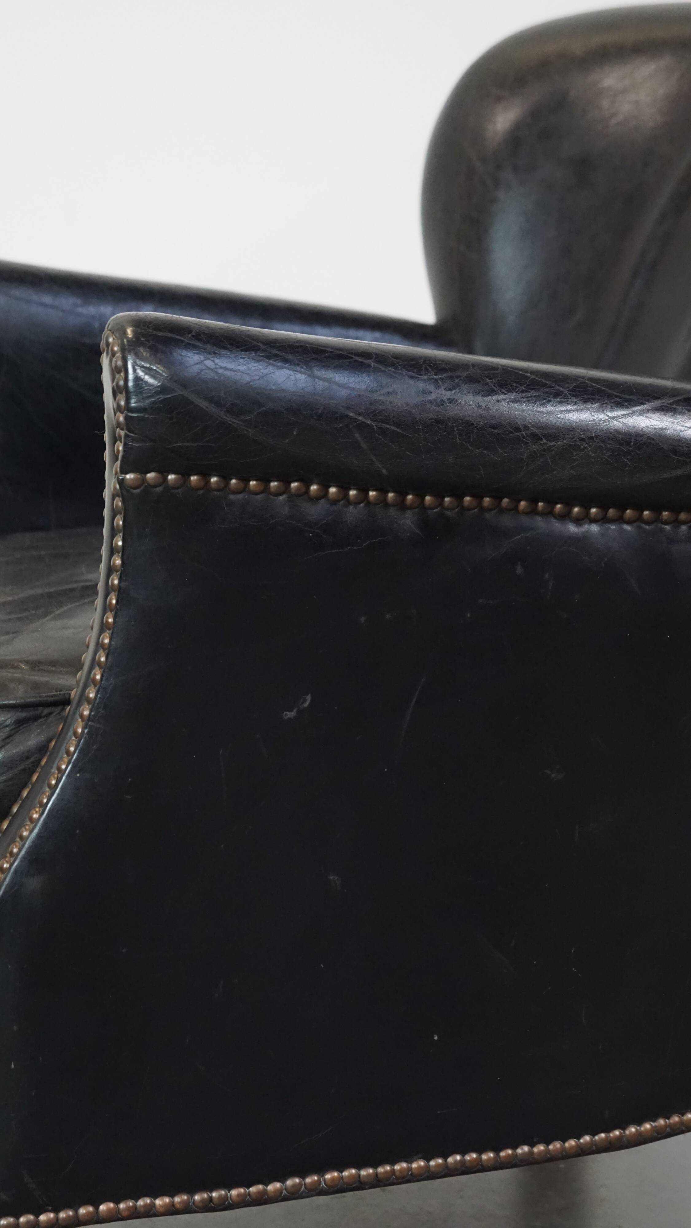 Fauteuil en cuir noir