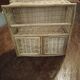 Rattan wall shelf
