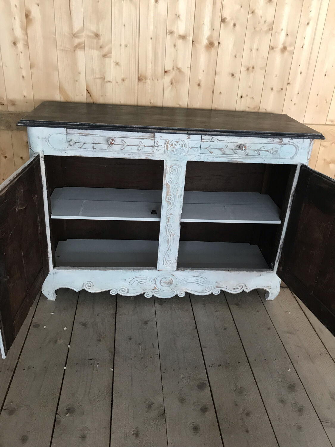 Patinated carved sideboard