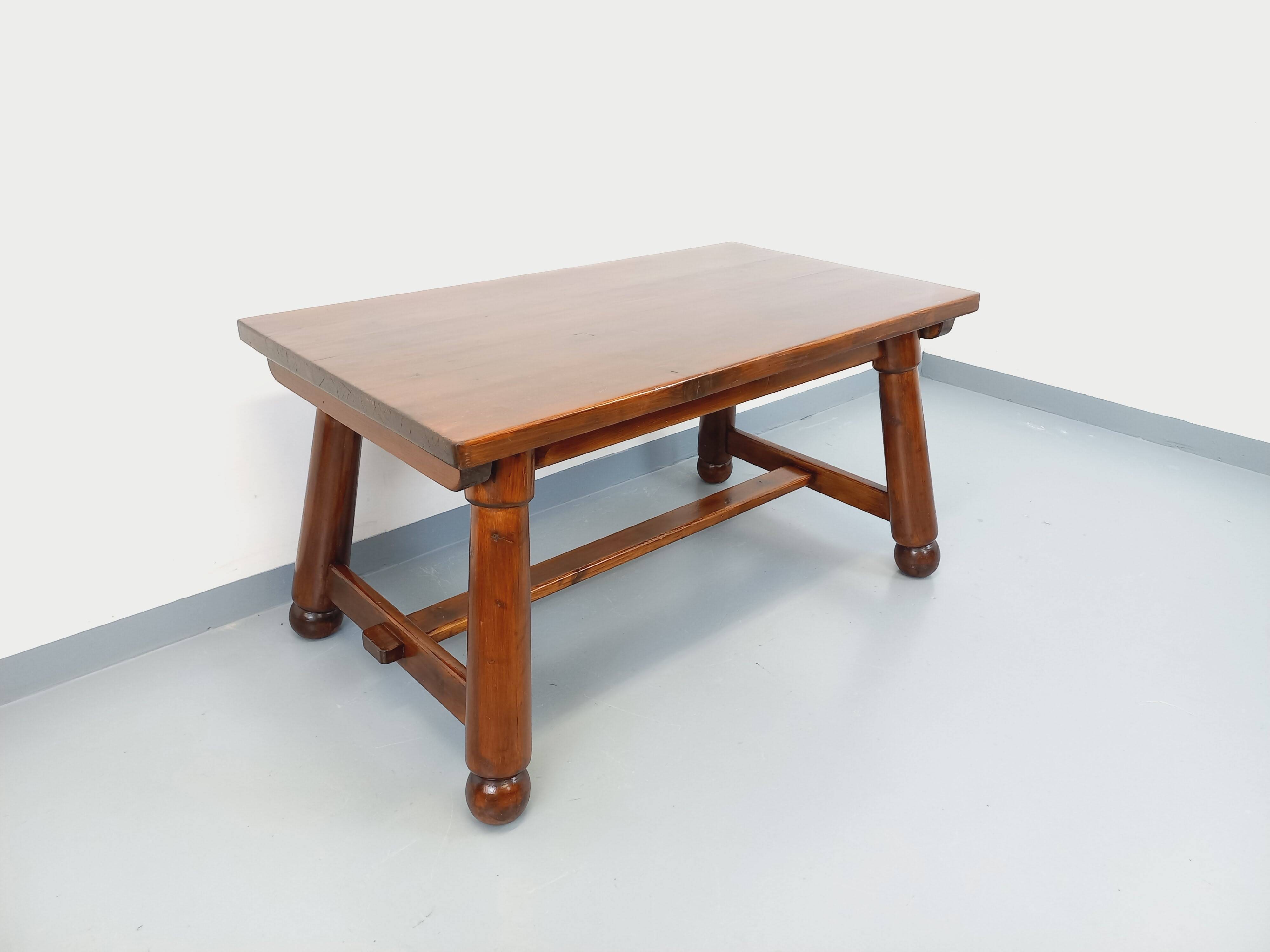 Brutalist rectangular dining table by Georges Robert in pine wood.