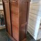 Double curtain binder in blond mahogany