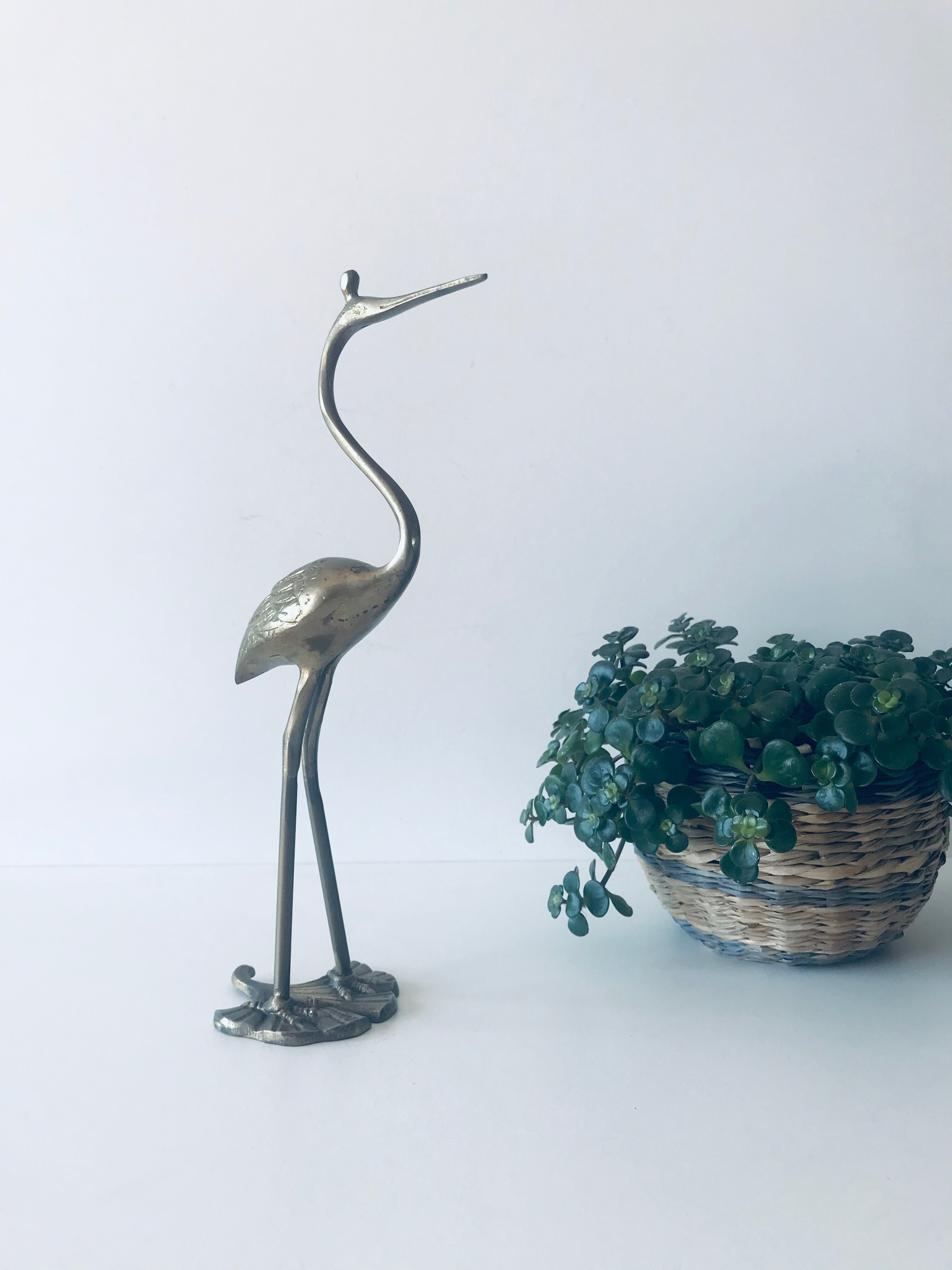 Heron, brass bird
