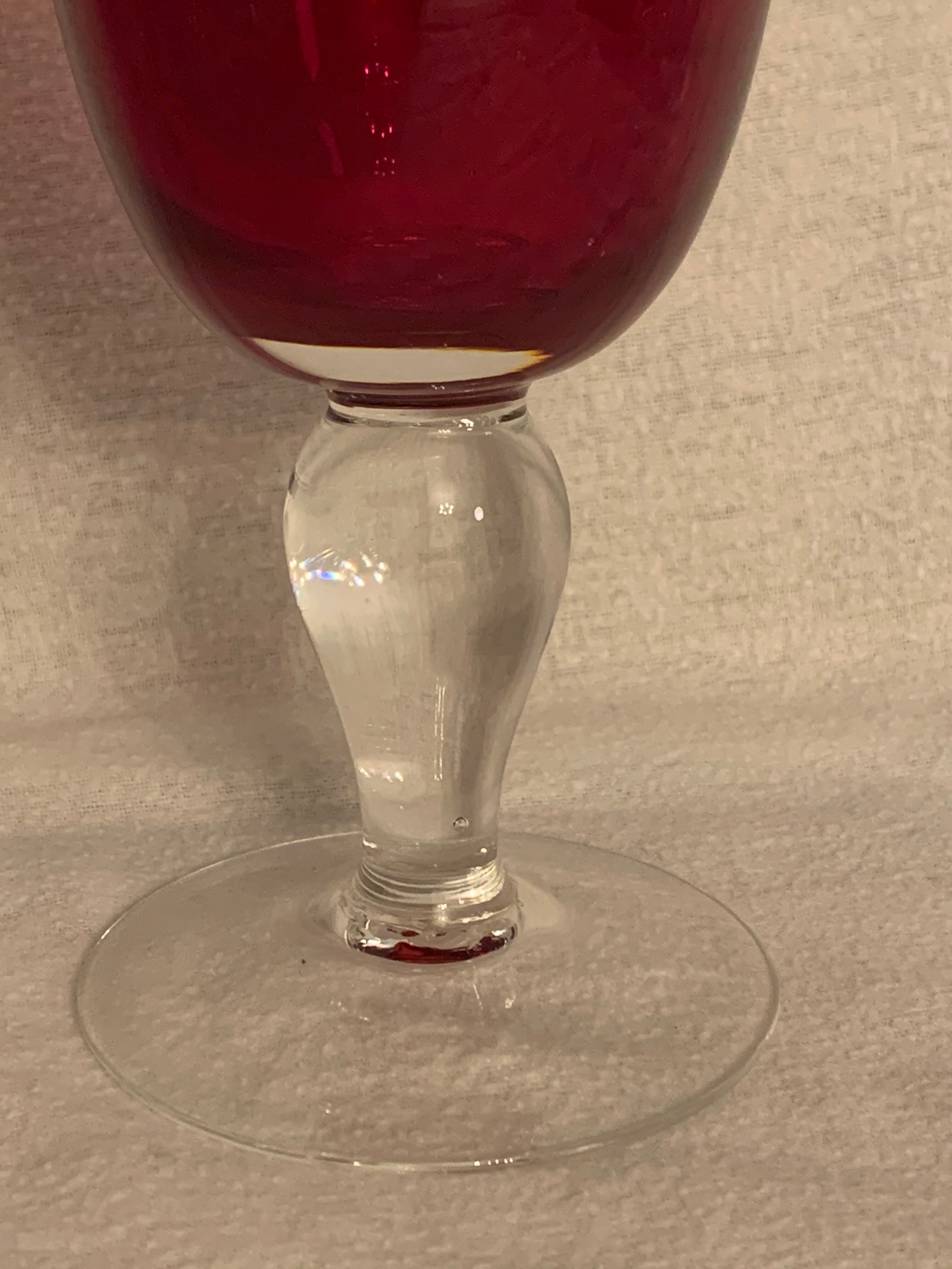 6 red bubbled puffed glasses on foot