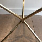 Round coffee table of neoclassical style in brass