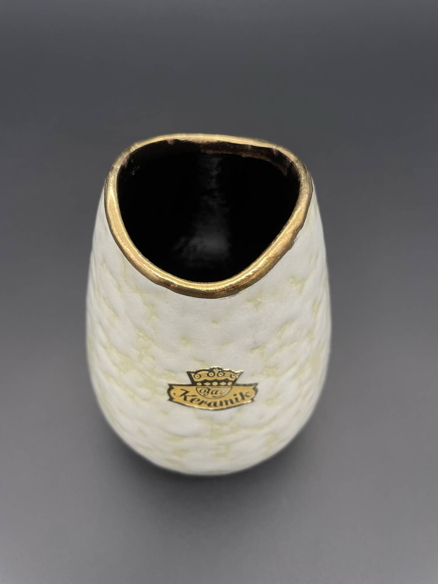 Small Bay Keramik vase with pearlescent glaze and gold trim.