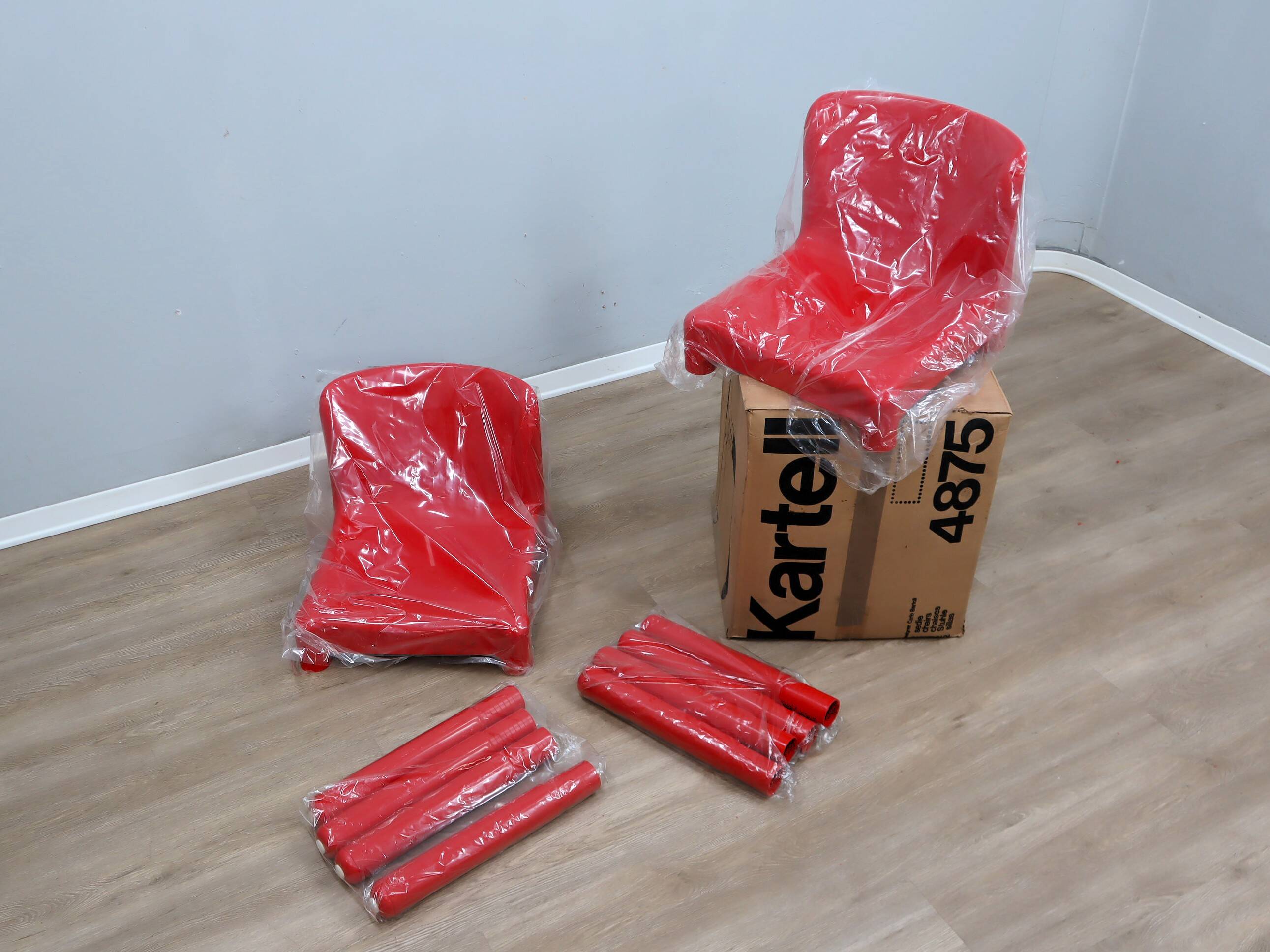 1970s pair of Kartell Model 4875 Chairs by Carlo Bartoli (fund STOCK)