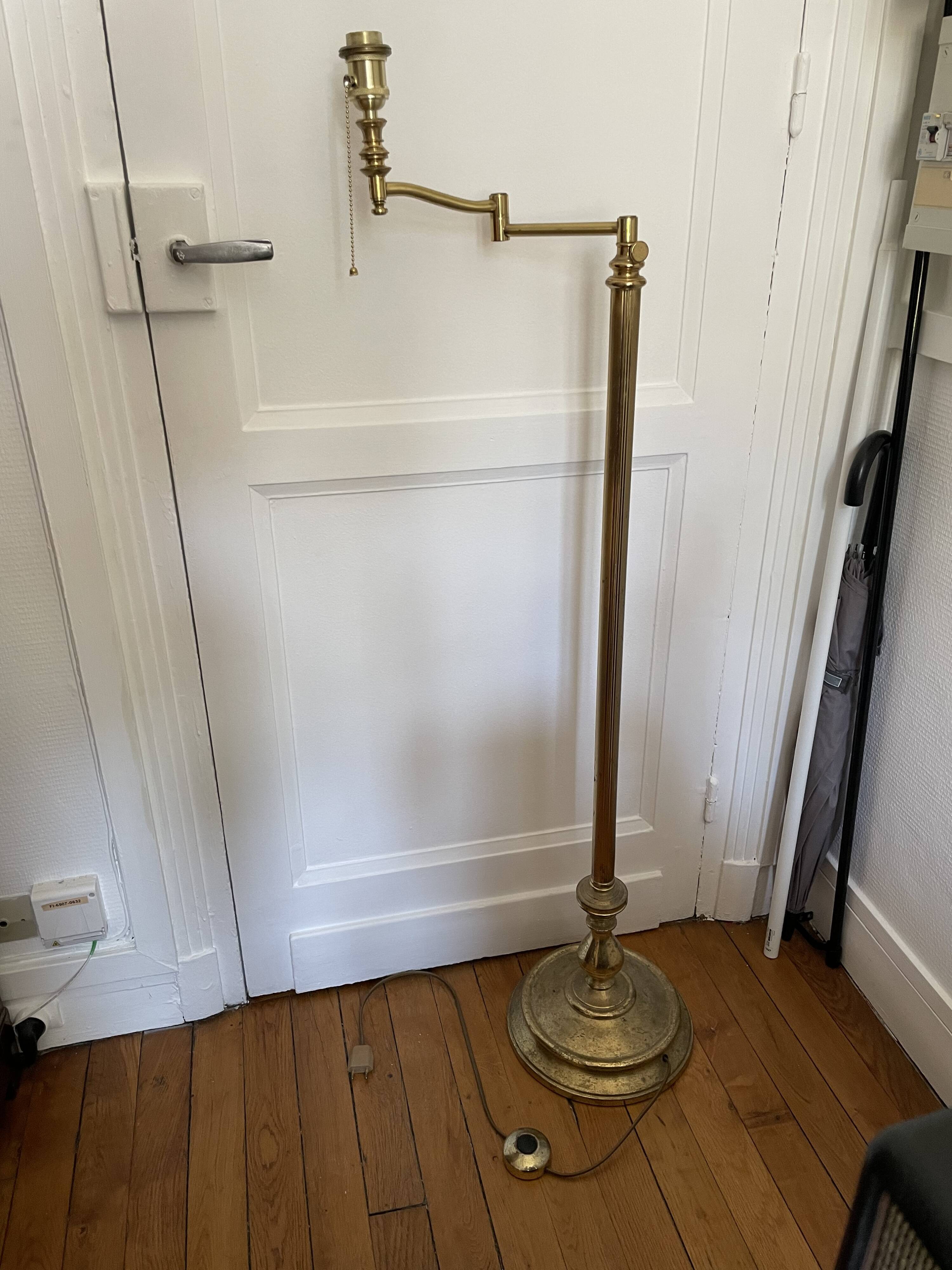 Articulated brass and gold metal floor lamp