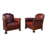Pair of french leather club chairs, normandy moustache models circa 1910