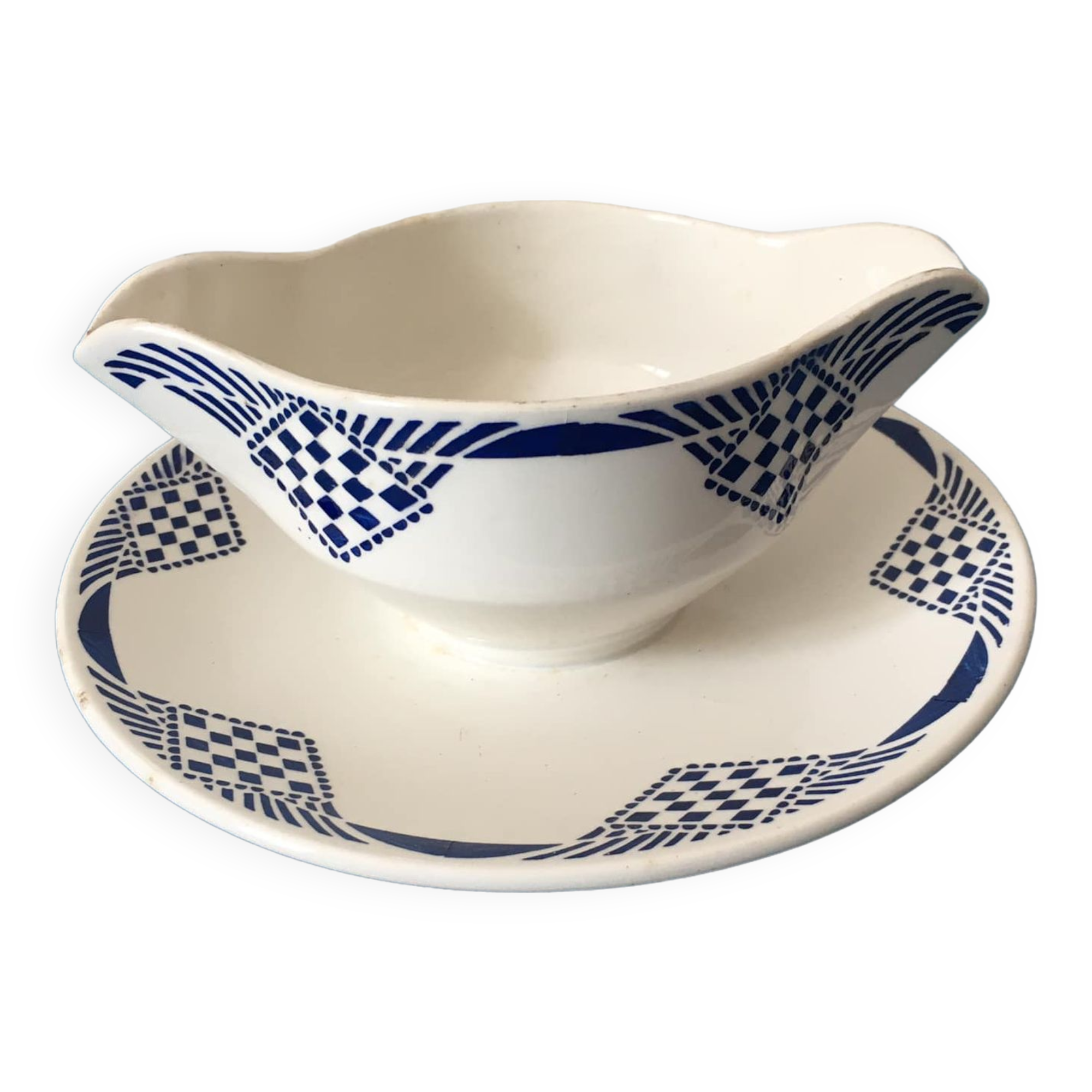Porcelain gravy boat stamped Moulin des Loups & Hamage - Orchies. “Puppet” model