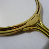Old mirror double face with golden hand