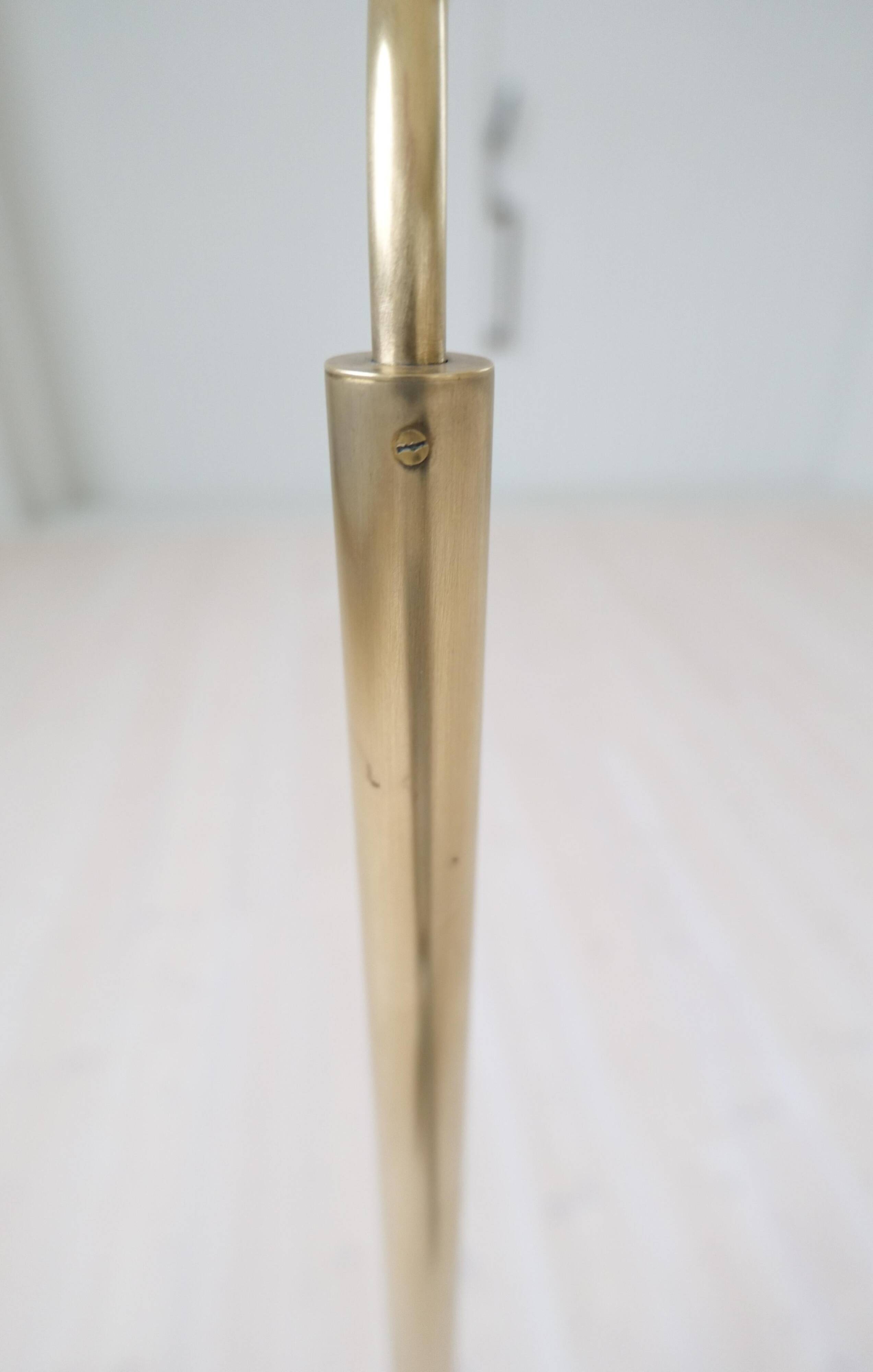 Sculptural modern brass floor lamps from the mid-century Luxus, Sweden, 1970s.