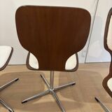 Lot of 4 vintage swivel chairs in the style of Arne Jacobsen.