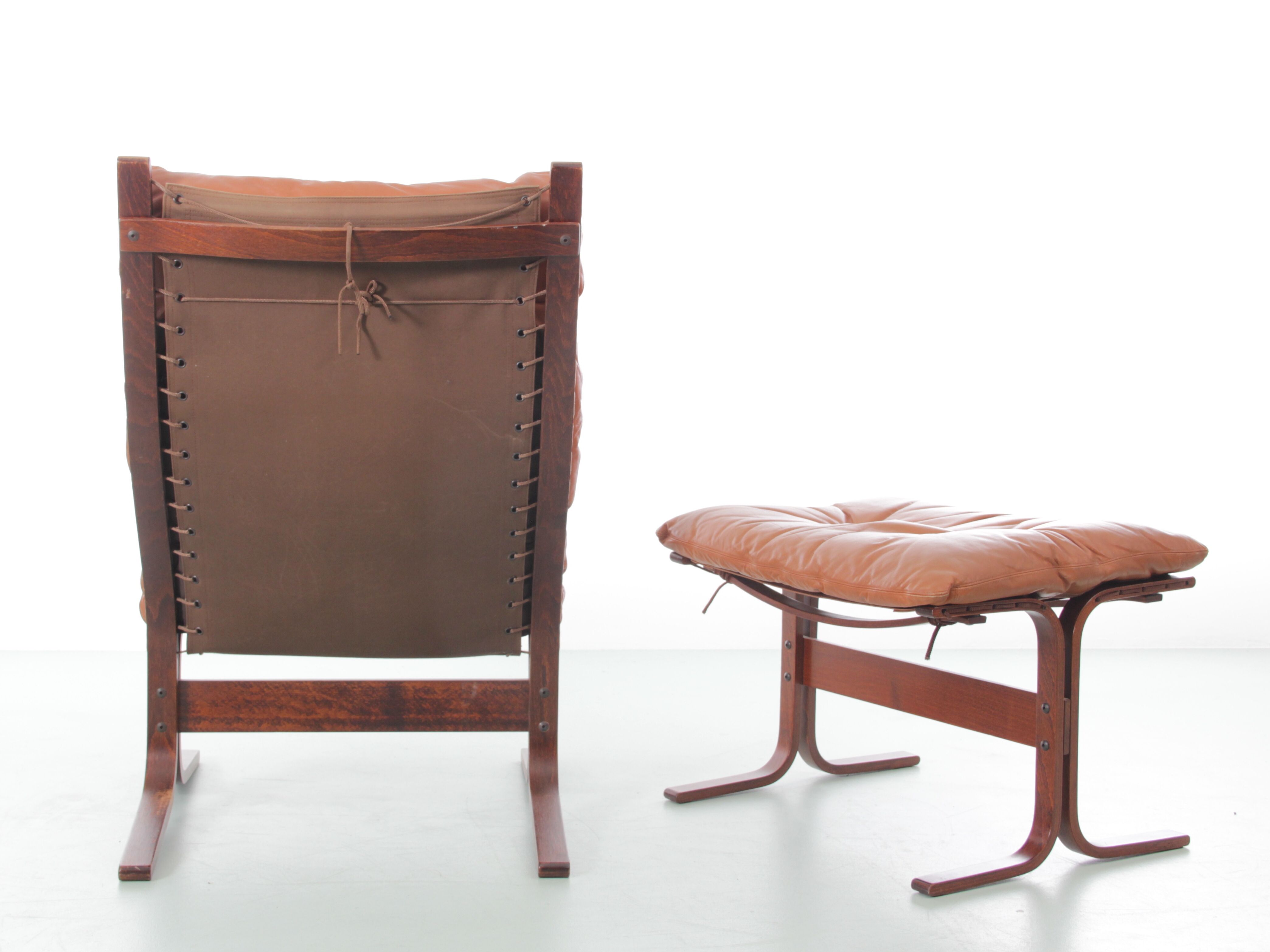 Scandinavian chair model Siesta, high back and foot rests