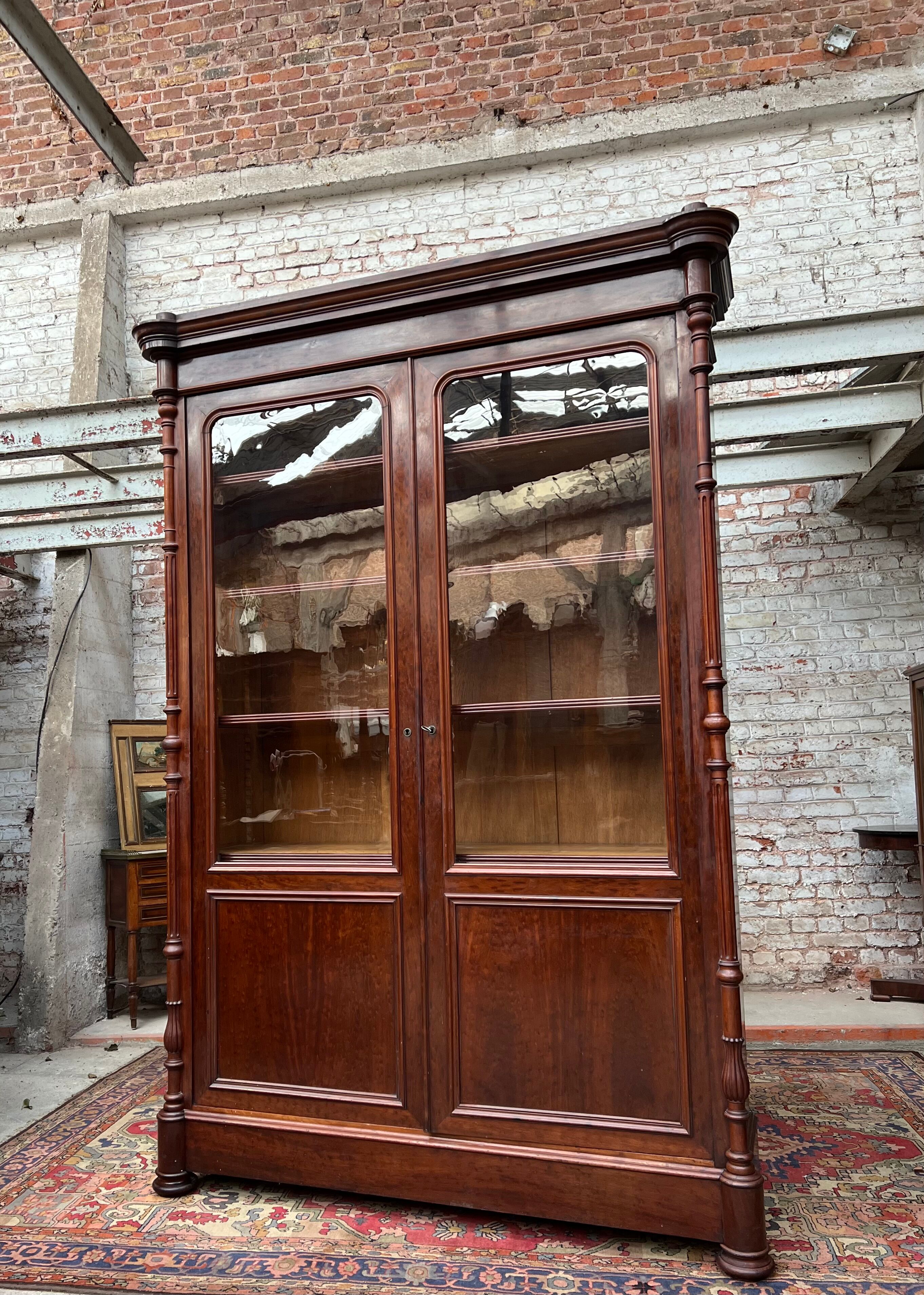 Speckled mahogany bookcase of Napoleon III XIX century