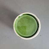 Green glazed ceramic flowerpot on stand