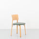 Kusch &Co chair made of wood and green fabric