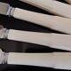 Set de 12 couteaux vintage inox et bakélite "Fleur de Lys"