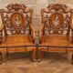 Pair of Asian armchairs in carved wood with mother-of-pearl inlays.