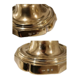 Pair of candle holders with punches