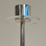 Silver-plated metal and plexiglass design candlestick.