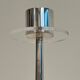 Silver-plated metal and plexiglass design candlestick.
