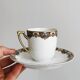 7 Limoges porcelain cups and saucers with gold decoration and floral motif.