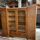 Showcase library in Neoclassical style, 1930, walnut burl and bronze.