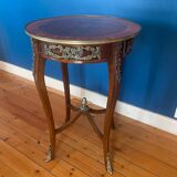 High wooden pedestal table