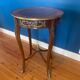 High wooden pedestal table