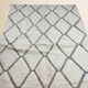 Beni Ouarain Berber rug • Brown diamond pattern on a beige background