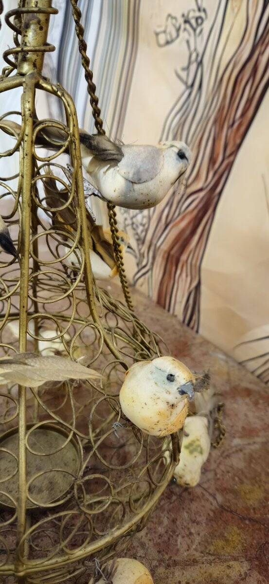 Golden metal birdcage – decorative work from the 20th century