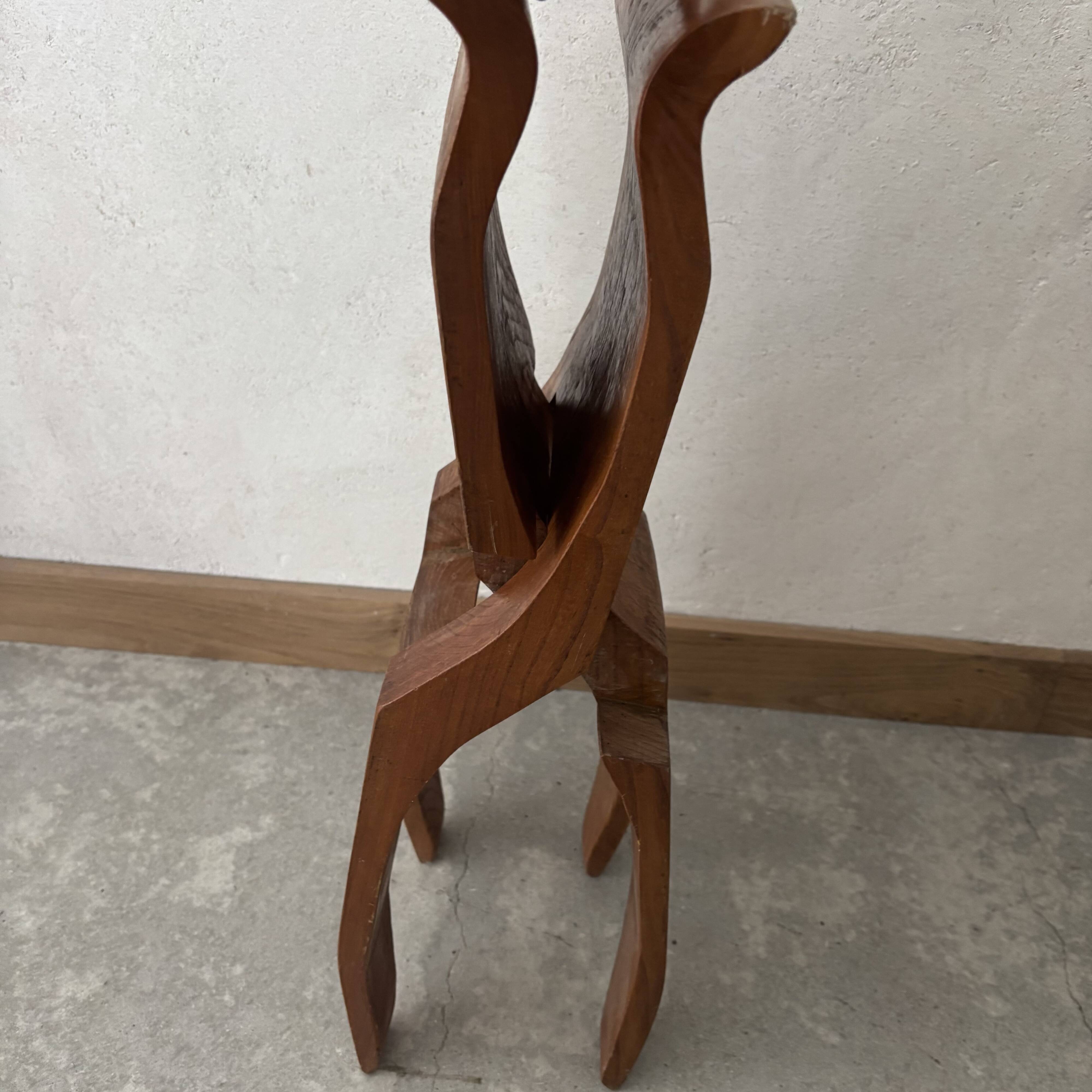 Tabouret en bois sculpté
