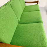 Living room sofa and Scandinavian design armchairs from the 1960s in green boucle.