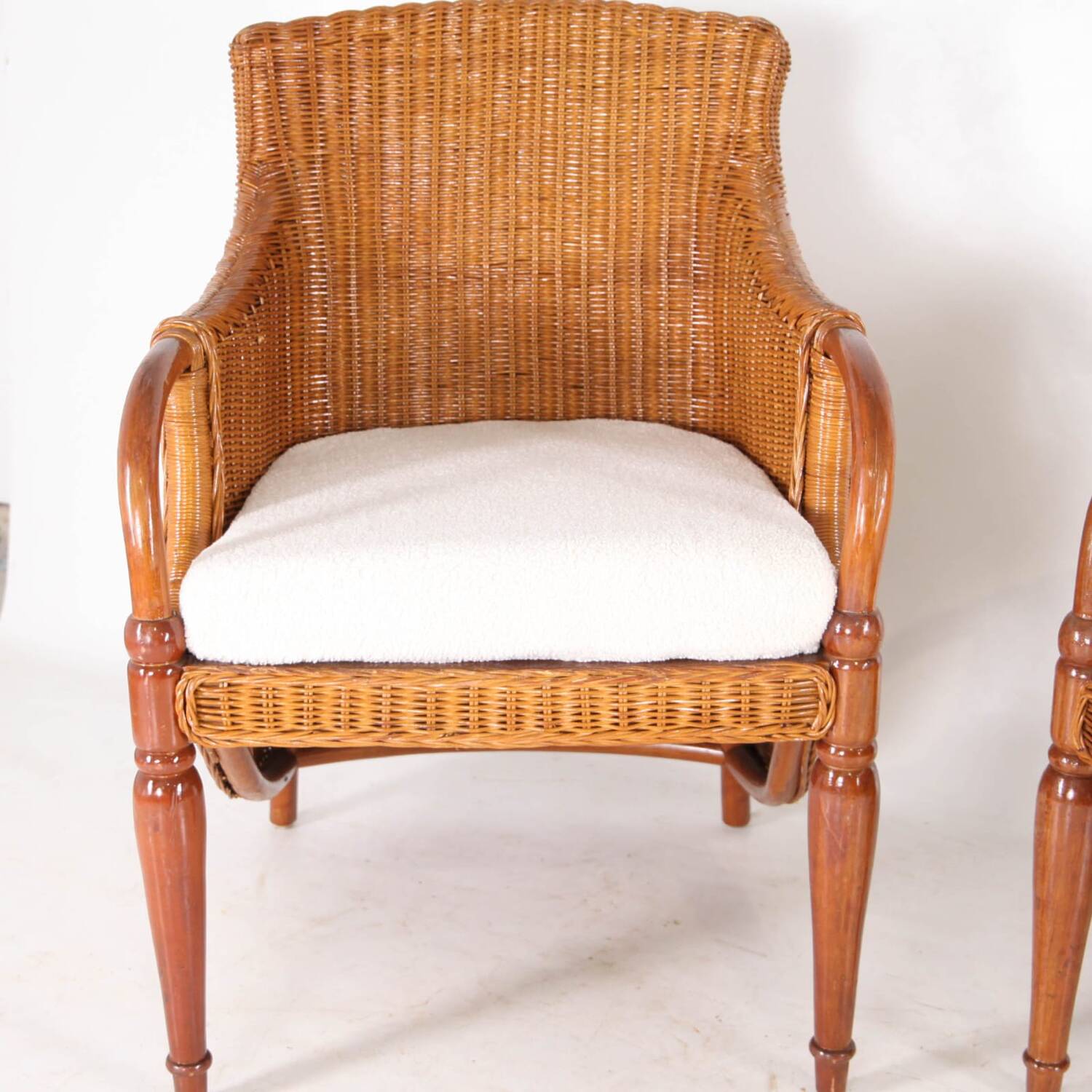 Pair of wooden and wicker armchairs