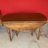 Cherry wood drop-leaf table.