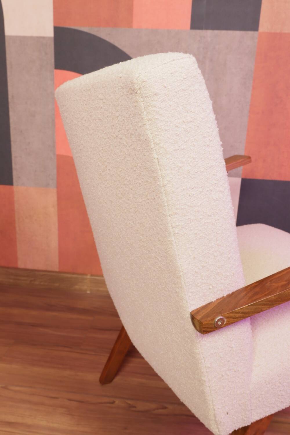 Vintage beige bouclé armchair with walnut wood from the 1950s.