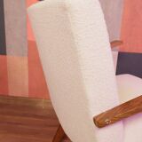 Vintage beige bouclé armchair with walnut wood from the 1950s.