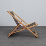 Modernist folding lounge chair with wooden frame, 1970s