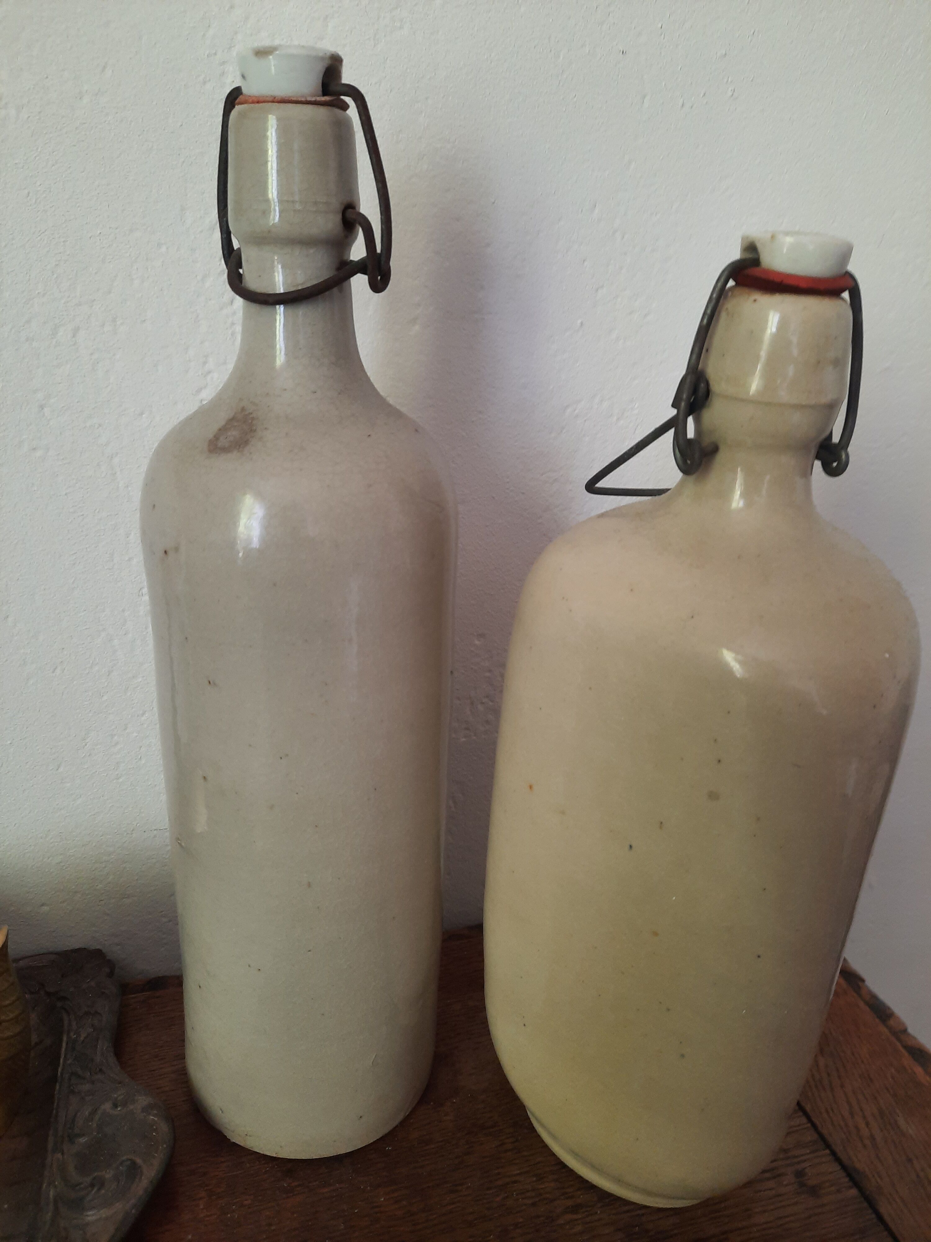 Pair of sandstone bottles