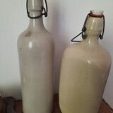 Pair of sandstone bottles