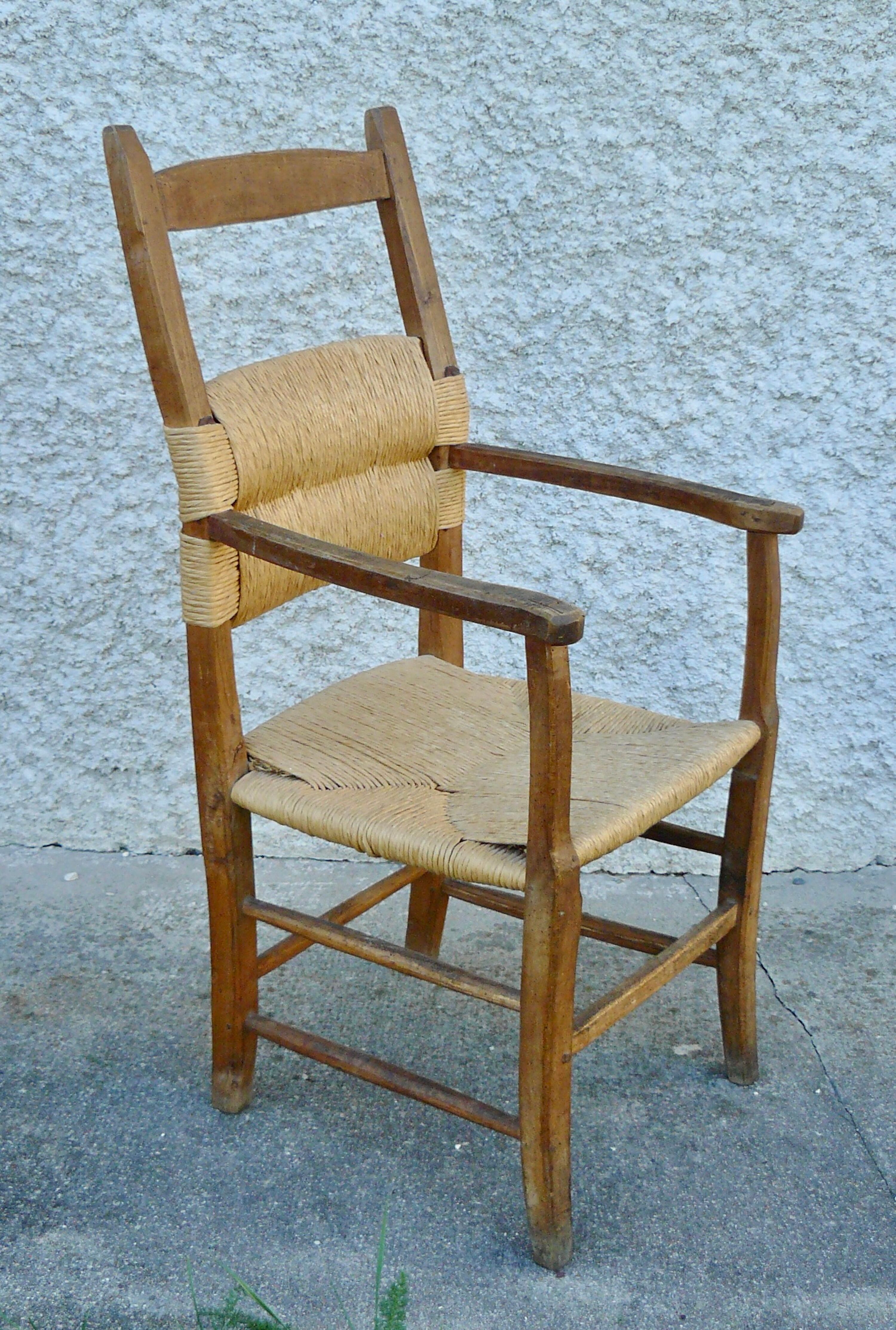 Brutalist straw armchair Folk art