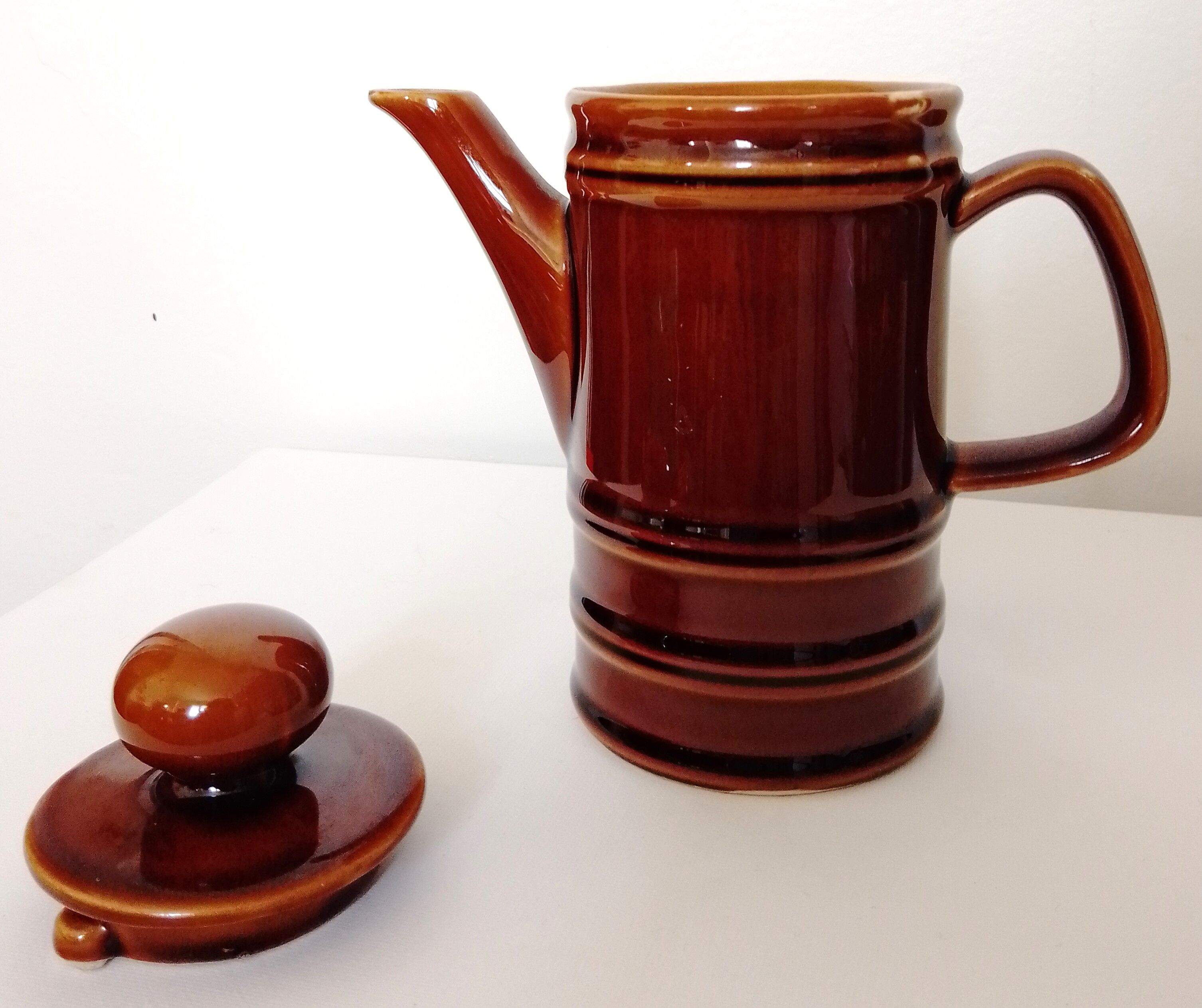 Brown ceramic coffee maker